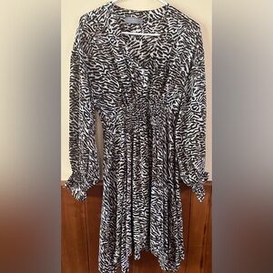 BOHO BOUTIQUE size SMALL, zebra print, long sleeved asymmetrical hemline dress.